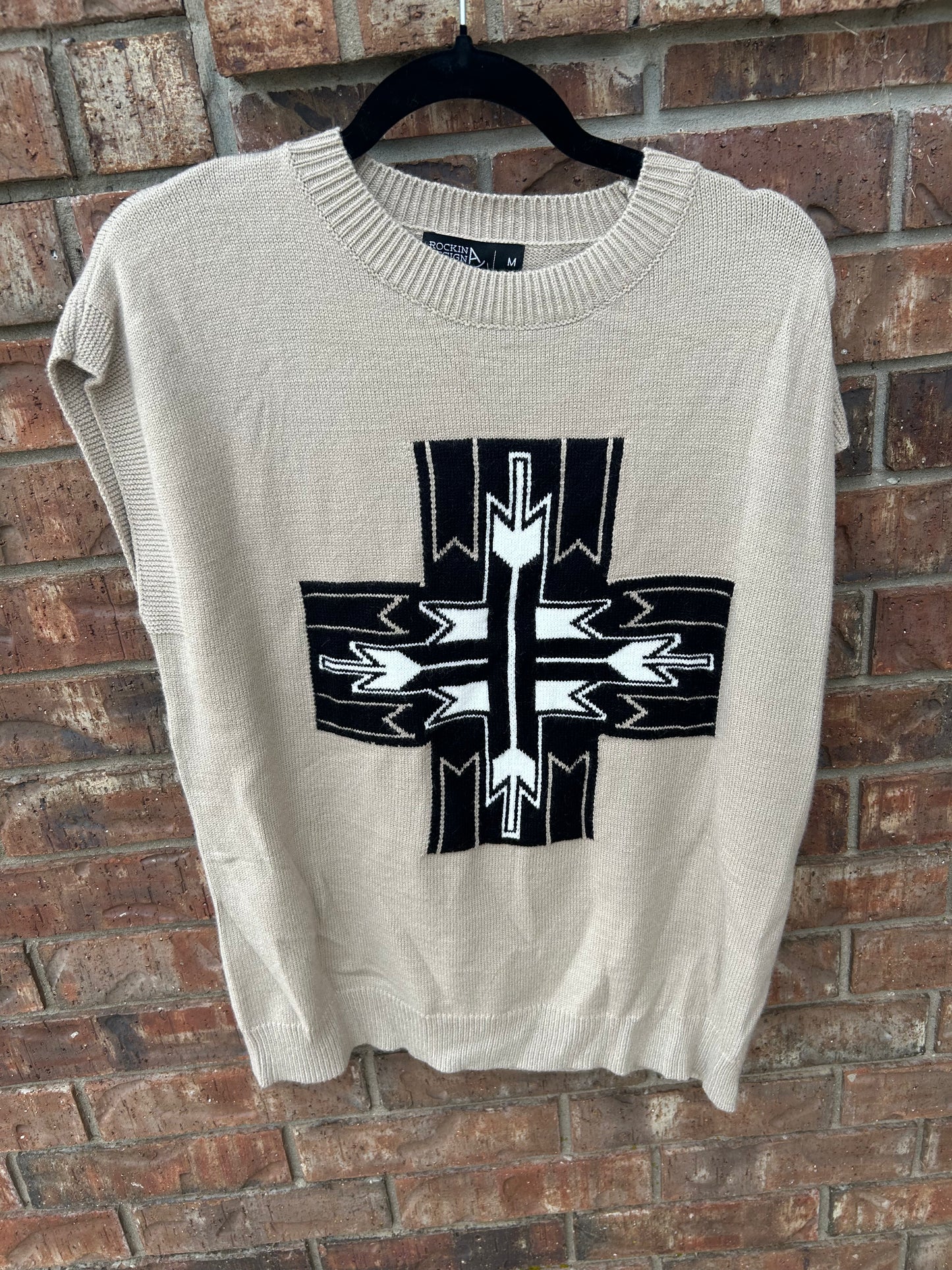 cross sweater vest