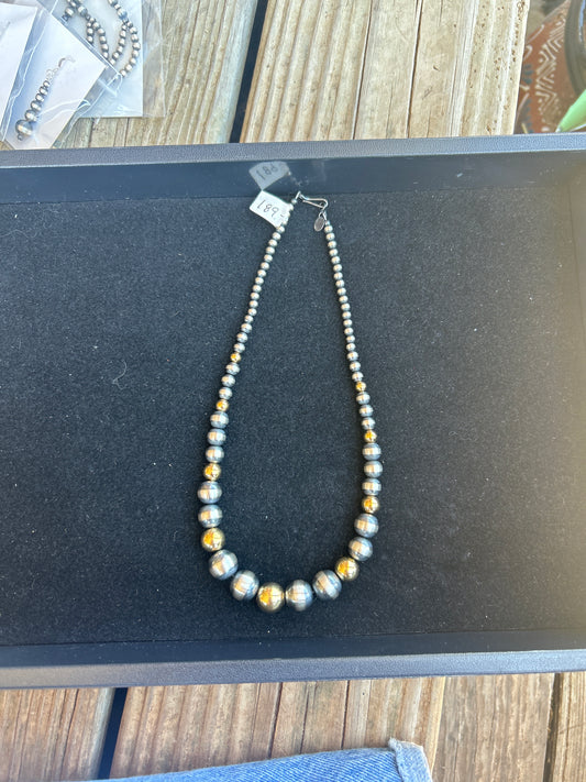 Gold + Sterling graduated pearls